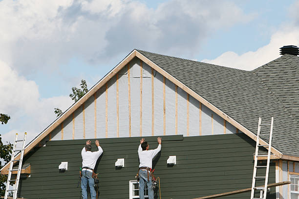 Professional Siding technician working in Lexington, NC